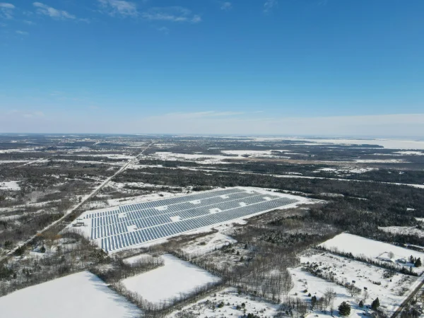 Utility-scale solar photovoltaic power plant integrated with battery energy storage system for renewable energy optimization.